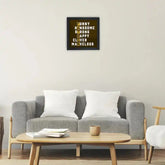 Father's Day poster frame displayed above a modern sofa, ideal home decor gift for dad with premium black frame and motivational words.